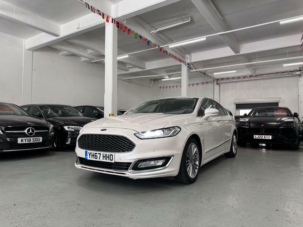 Compare Ford Mondeo Saloon YH67HHO White