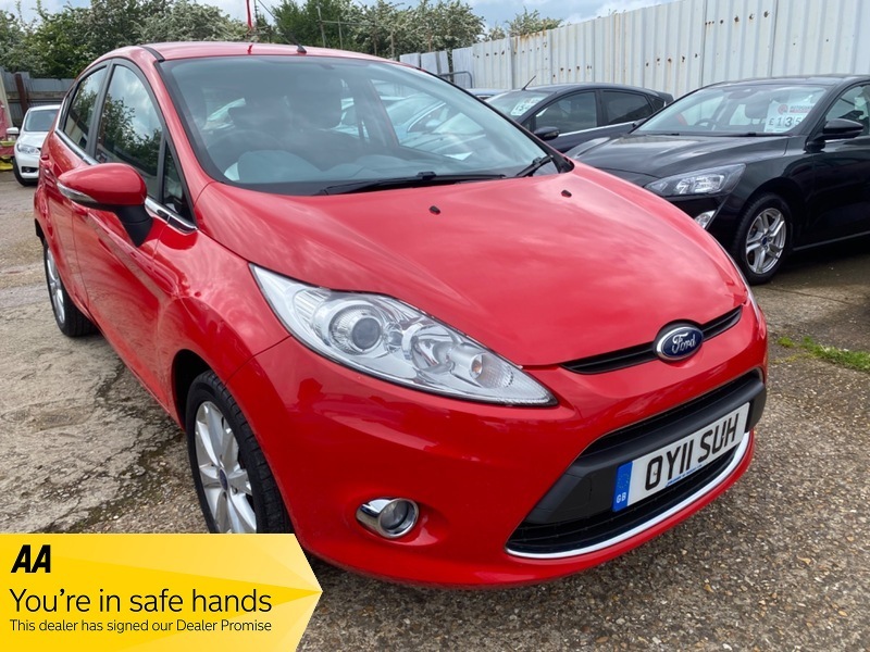 Compare Ford Fiesta Zetec OY11SUH Red