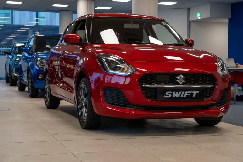 Compare Suzuki Swift Hatchback  Red