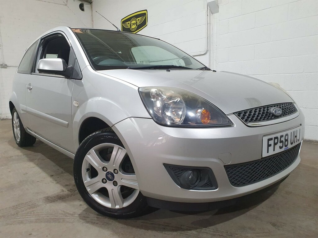 Compare Ford Fiesta 1.4 Zetec Climate FP58UHJ Silver