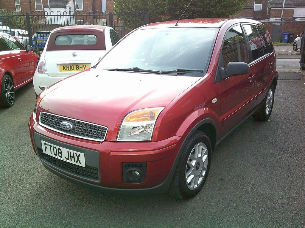 Compare Ford Fusion 1.4 Tdci Zetec Climate FT08JHX Red