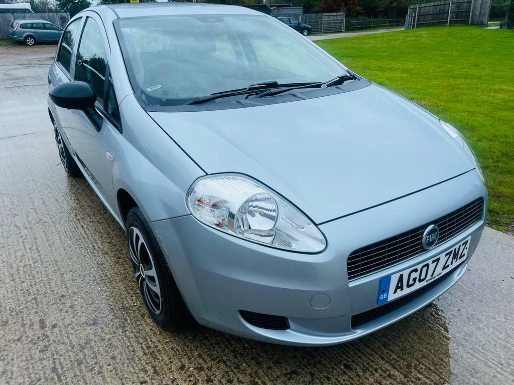 Fiat Grande Punto 1.4 8V, model year 2006-, silver, driving