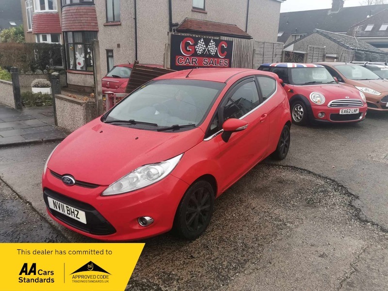Compare Ford Fiesta Zetec NV11BHZ Red