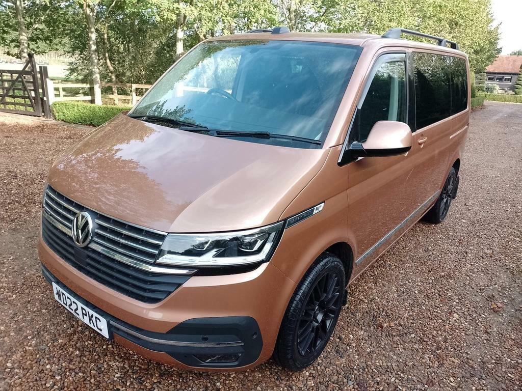 Compare Volkswagen Caravelle Caravelle Executive Tdi 4Motion S-a WD22PKC Brown
