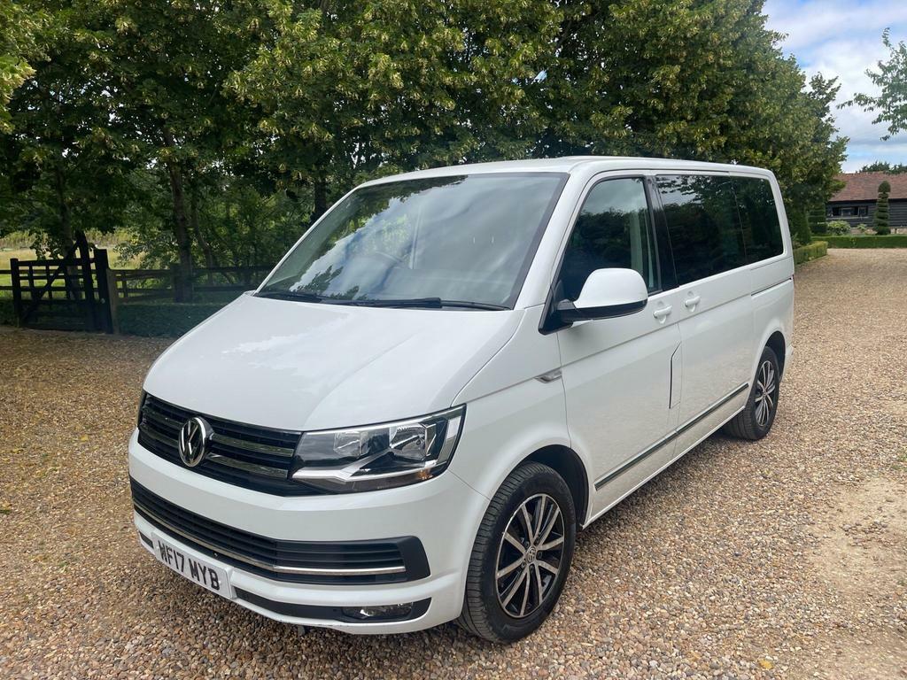 Compare Volkswagen Caravelle Caravelle Executive Tdi Bluemotion Technology WF17MYB White