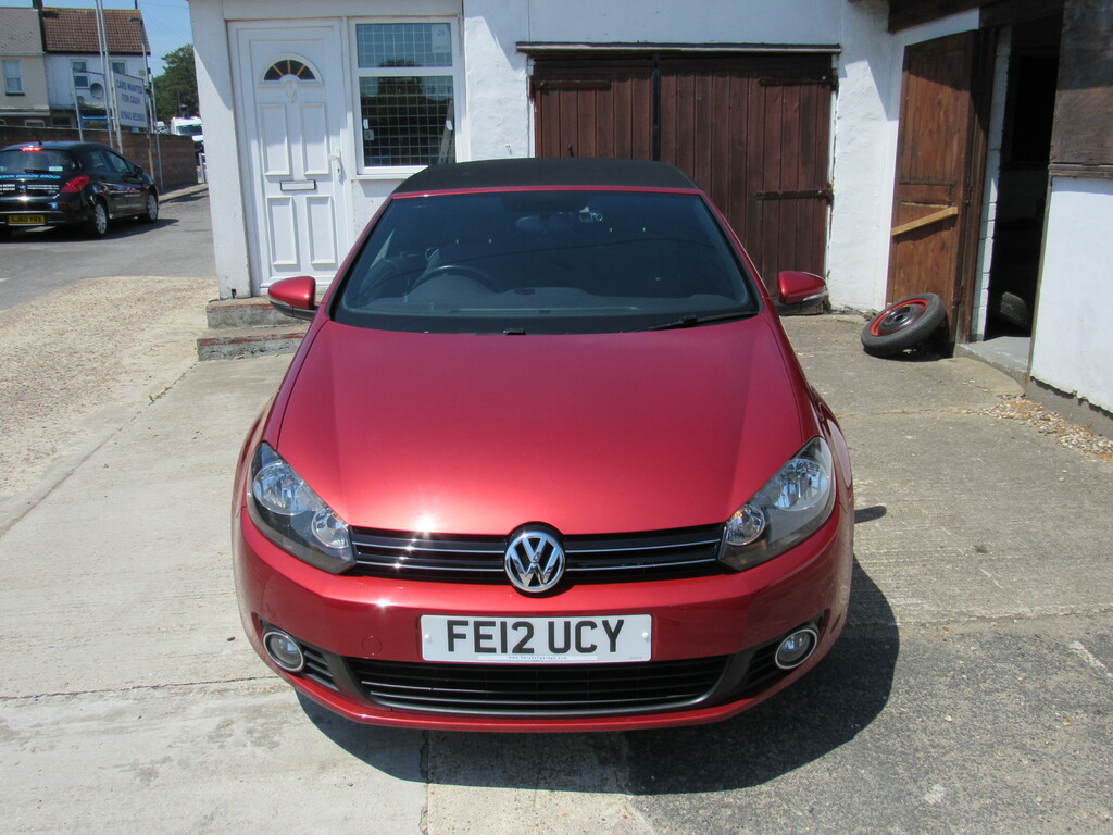Compare Volkswagen Golf S FE12UCY Red