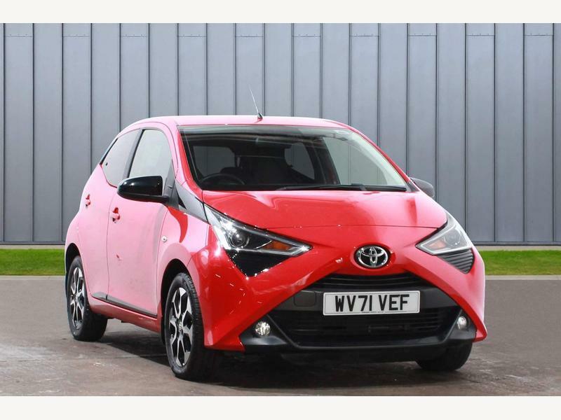 Compare Toyota Aygo 1.0 Vvt-i X-trend Euro 6 Ss 5... WV71VEF Red