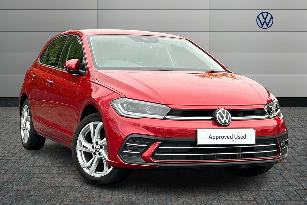 Compare Volkswagen Polo Polo Style Tsi VN23KNG Red