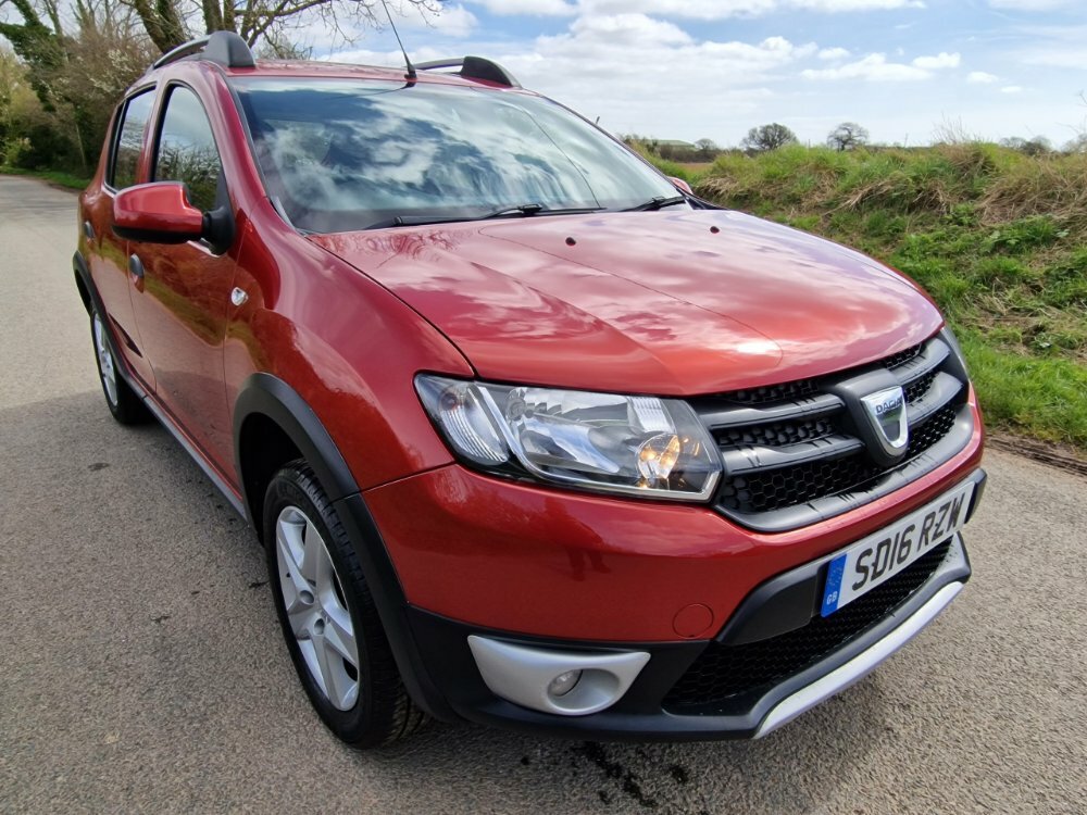 Compare Dacia Sandero Stepway 0.9 Tce Ambiance Start Stop SD16RZW Red