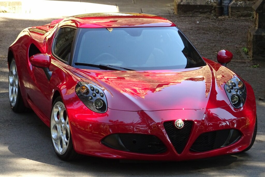 Compare Alfa Romeo 4C 4C Tbi EX65OLM Red
