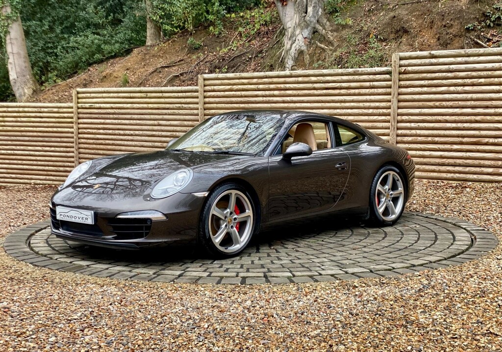Compare Porsche 911 Coupe EY13OXJ Brown