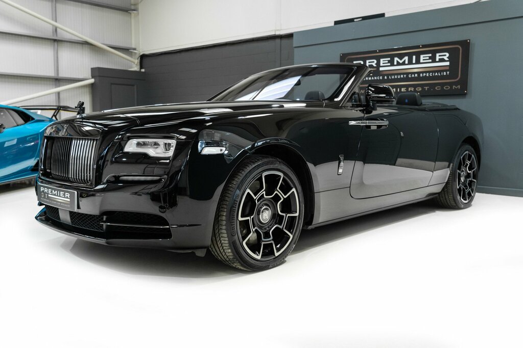Compare Rolls-Royce Dawn V12. Black Badge.  Black