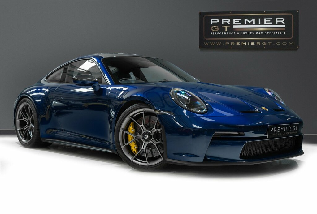 Compare Porsche 911 Gt3 Touring. 6-Speed  Blue