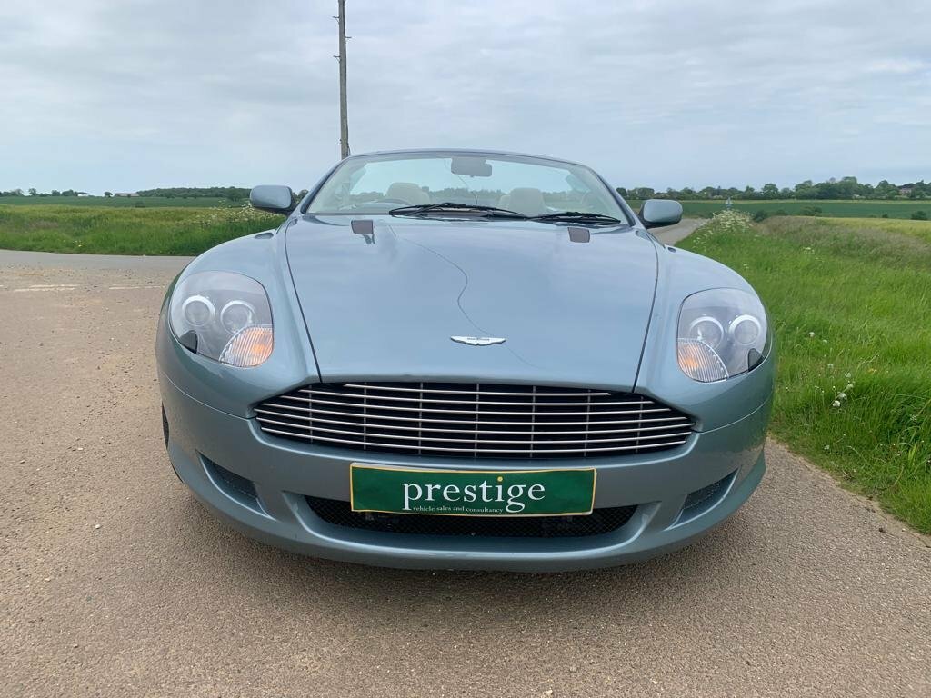 Compare Aston Martin DB9 Convertible V12 2006 GN56FYT Blue