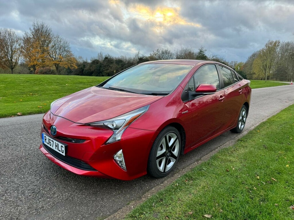 Compare Toyota Prius Vvt-i Excel RJ67HLG Red