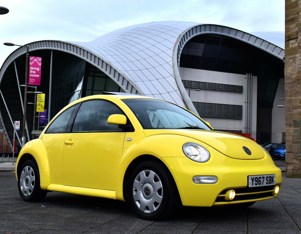 Compare Volkswagen Beetle Beetle Y967SBK Yellow