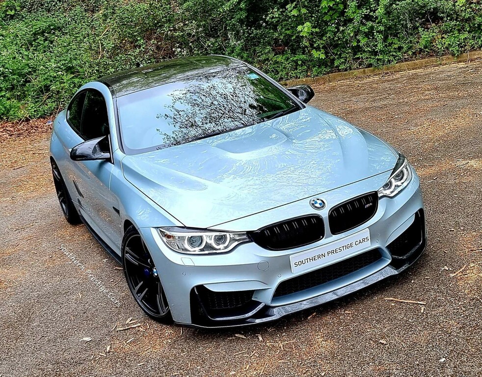 Compare BMW M4 M4 S-a NJ16XCO Blue
