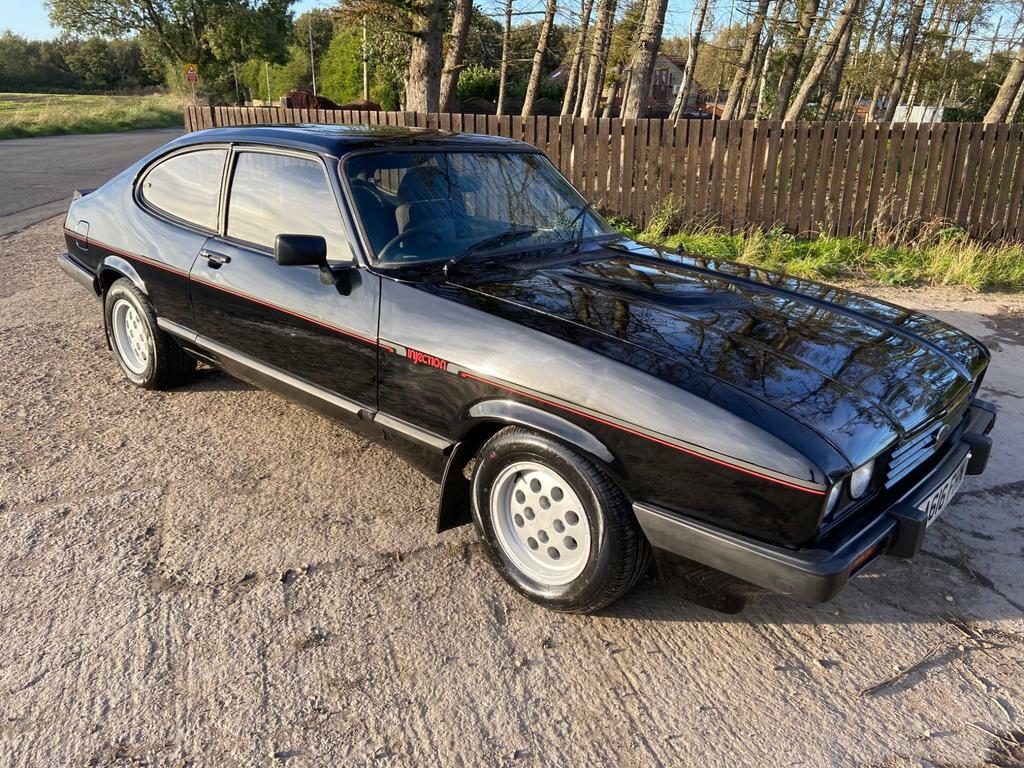 Compare Ford Capri 2.8 Injection Special Fastback A616FHN Black