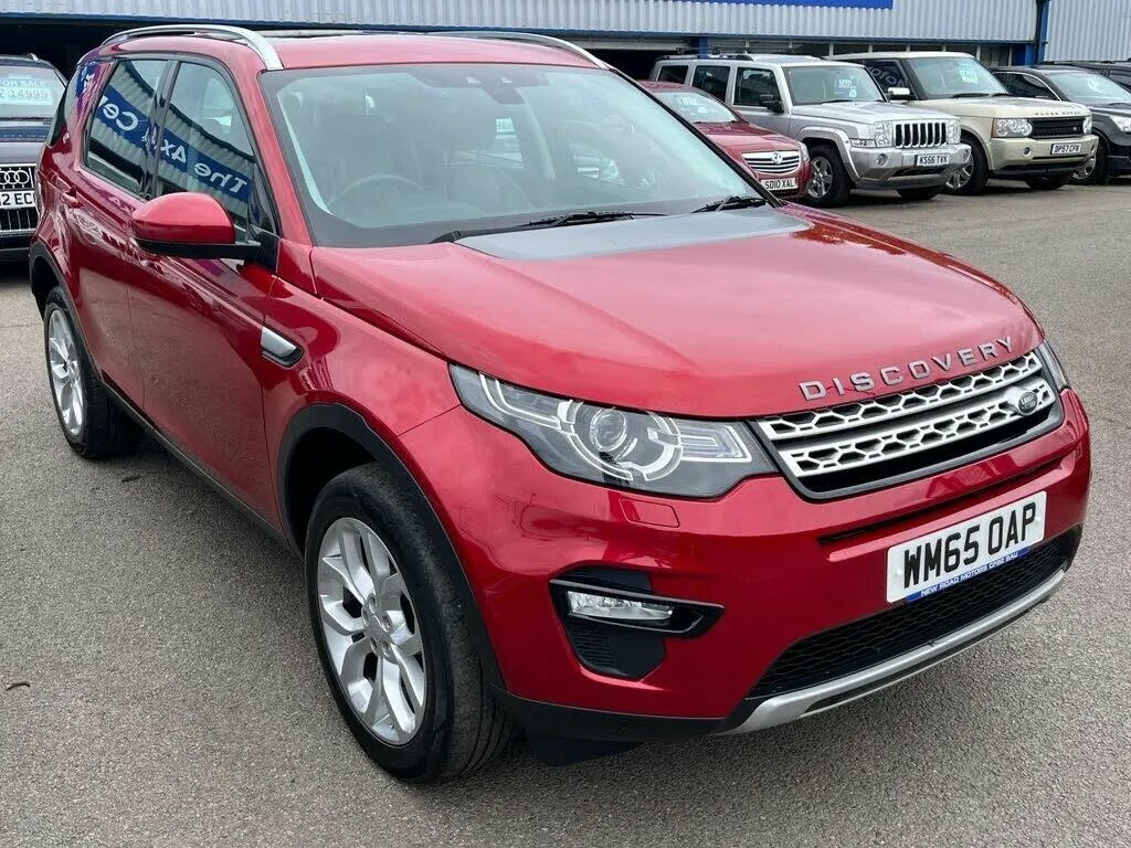 Compare Land Rover Discovery Sport Td4 Hse WM65OAP Red