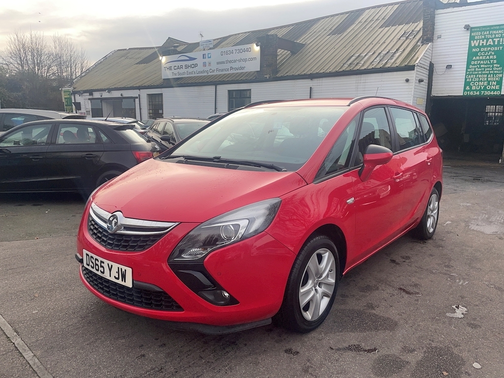 Compare Vauxhall Zafira Tourer I Turbo Exclusiv DS65YJW Red