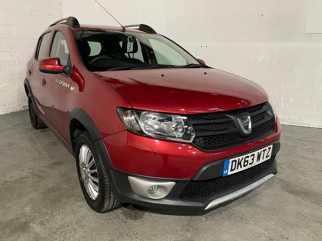 Compare Dacia Sandero Stepway 0.9 Tce Ambiance 2013 DK63WTZ Red