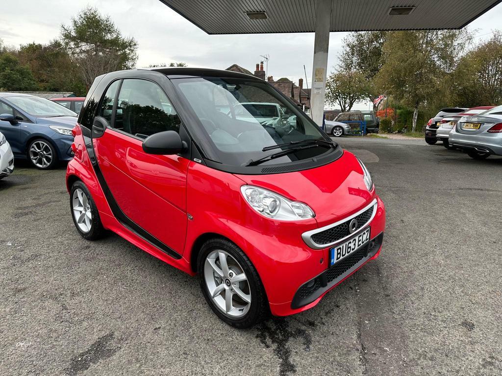 Compare Smart Fortwo 1.0 Mhd Pulse Softtouch Euro 5 Ss BU63ECZ Red