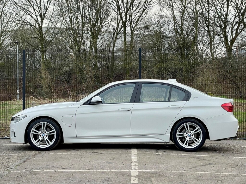 Compare BMW 3 Series 330E M Sport YB67VHT White