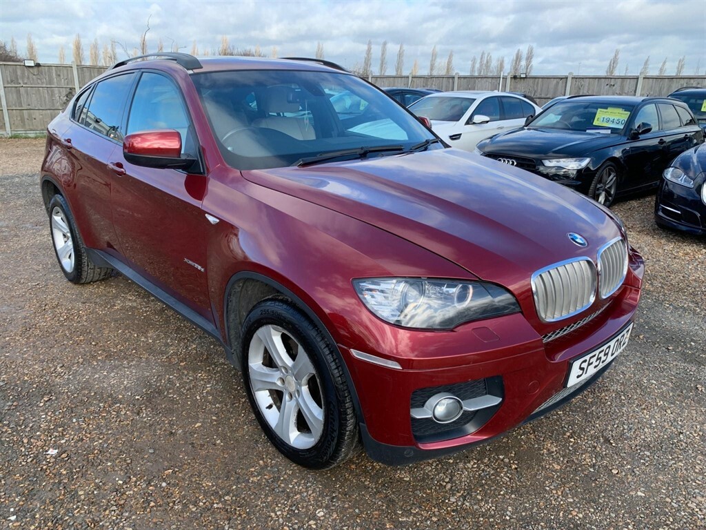 Compare BMW X6 3.0 35D Steptronic Xdrive Euro 4 SF59ORZ Red