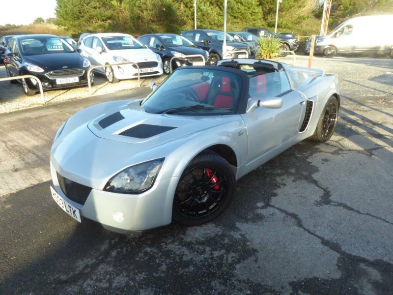 Compare Vauxhall VX220 2.0 Turbo 300 Ps Extensive Modifications HS03LTK Red