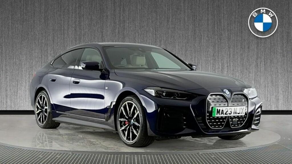 Compare BMW i4 Edrive35 M Sport MA23NJX Blue