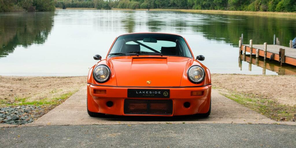Compare Porsche 911 Coupe BBK573M Orange
