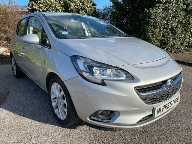 Compare Vauxhall Corsa Hatchback DK66FEH Silver