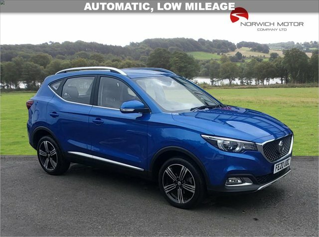 Compare MG ZS 1.0 Exclusive 110 Bhp FE20UOC Blue