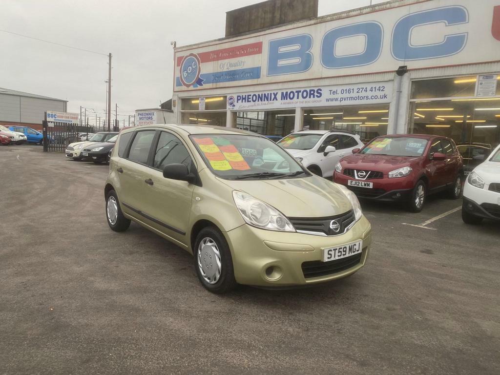 Compare Nissan Note Visia ST59MGJ Gold