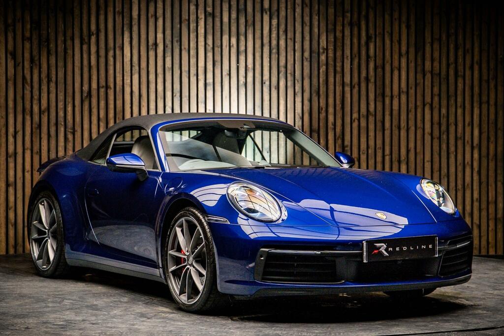 Compare Porsche 911 911 Carrera 4S WR20YTW Blue