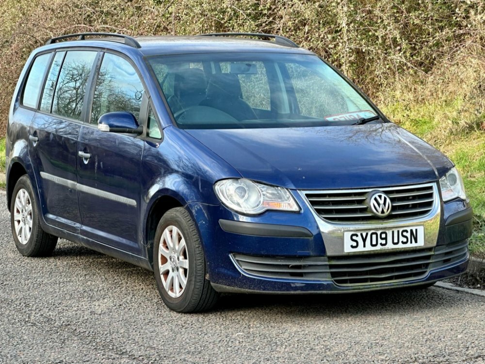 Compare Volkswagen Touran 1.9 Tdi S 7 Seats SY09USN Blue