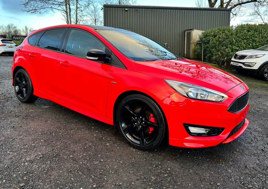 Compare Ford Focus Zetec S Tdci Red Edition YO66AYL Red
