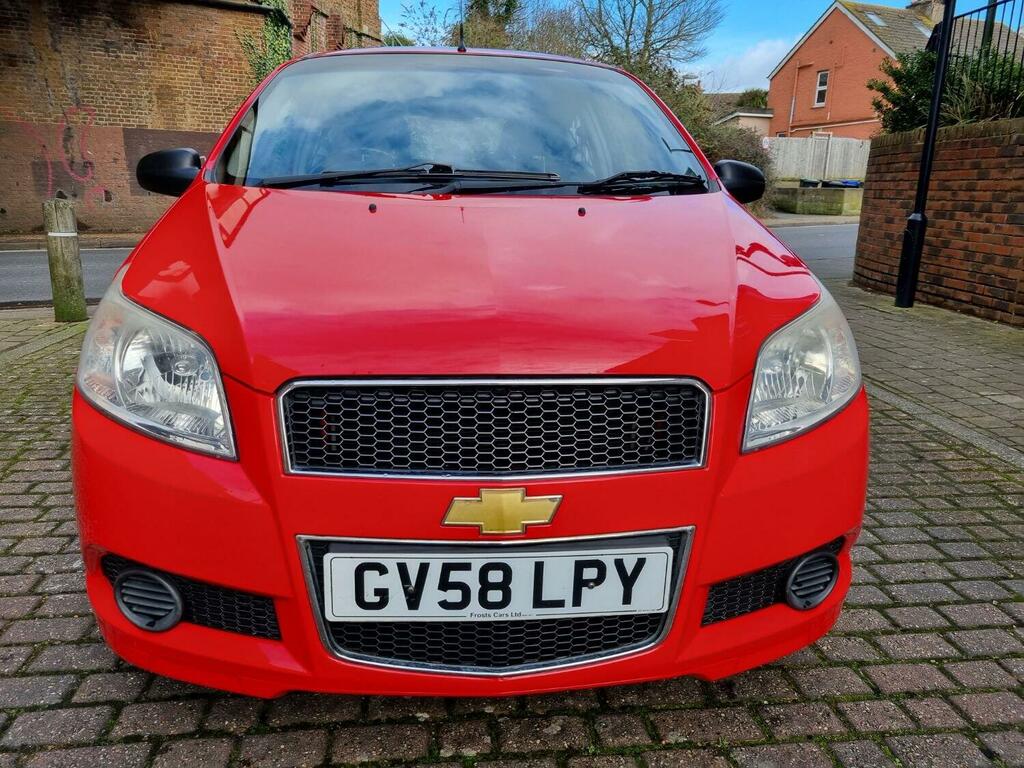 Compare Chevrolet Aveo Hatchback 1.2 S 200958 GV58LPY Red