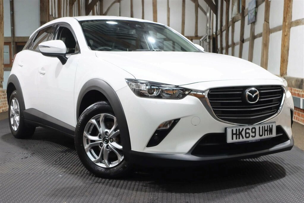 Compare Mazda CX-3 2.0 Skyactiv-g Se-l Nav Euro 6 Ss HK69UHW White