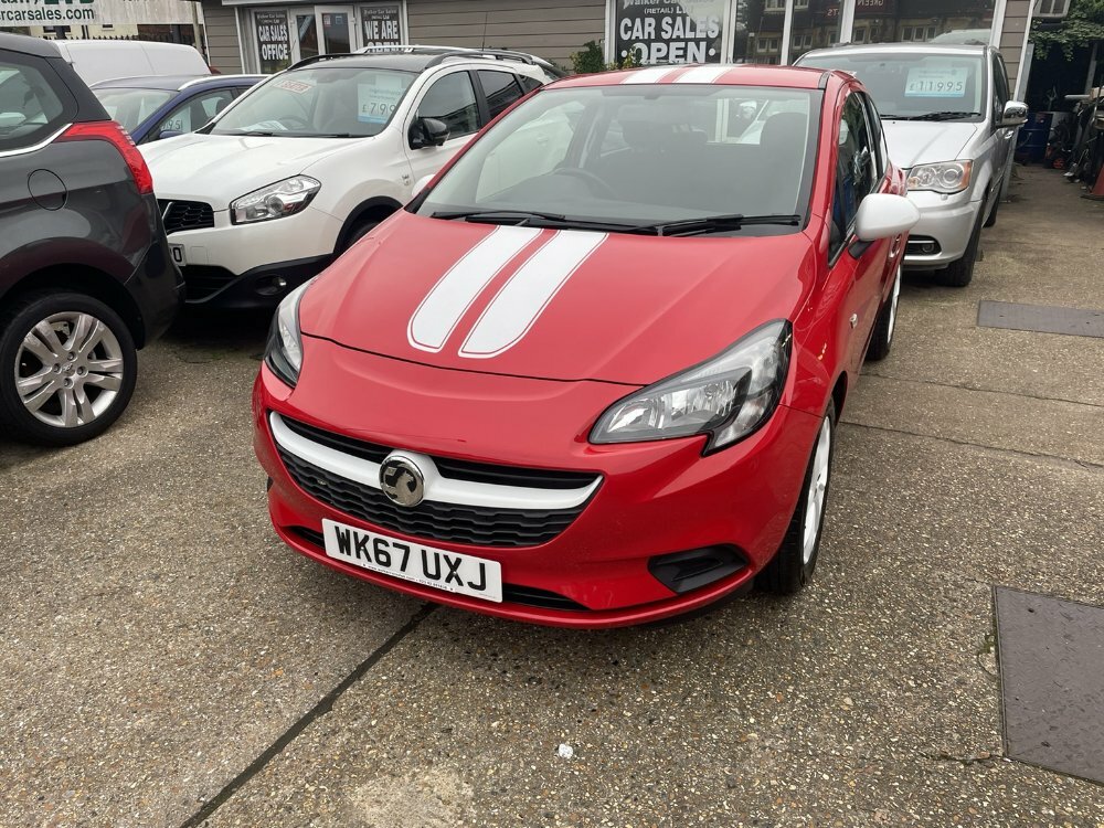 Compare Vauxhall Corsa 1.4 75 Sting WK67UXJ Red