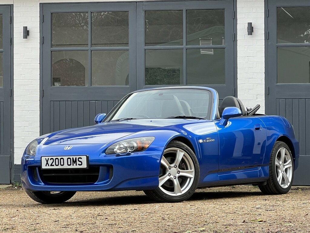 Compare Honda S2000 2.0 Roadster Convertible 237 G X200OMS Blue