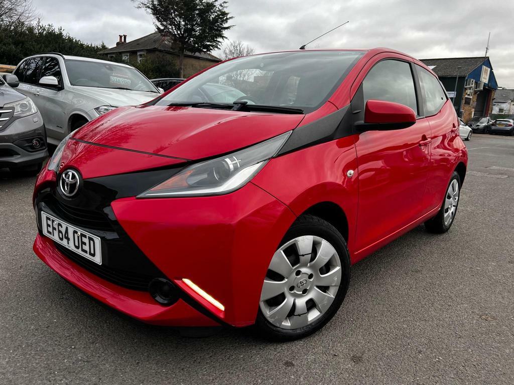 Compare Toyota Aygo 1.0 Vvt-i X-play X-shift Euro 5 EF64OED Red