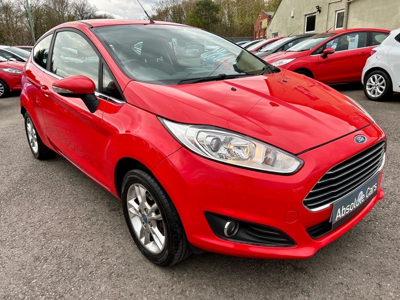 Compare Ford Fiesta Zetec YB14FLL Red