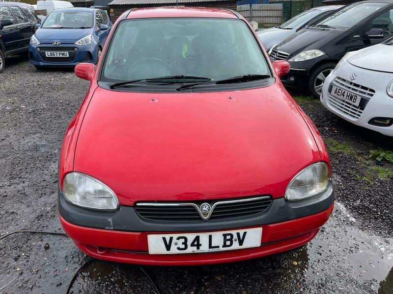 Compare Vauxhall Corsa 1.4I Cdx V34LBV Red