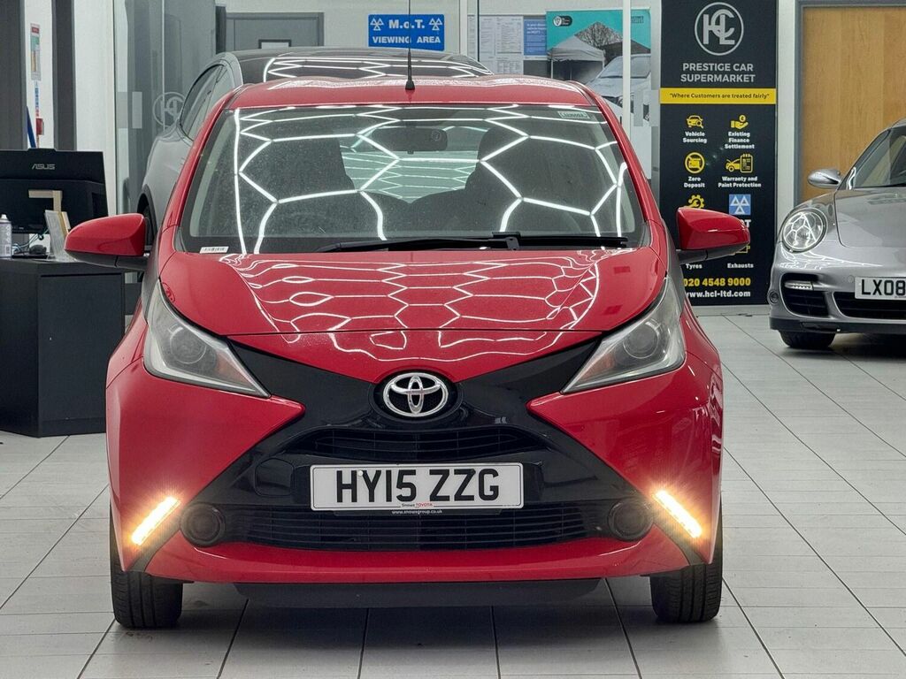 Compare Toyota Aygo Hatchback 1.0 Vvt-i X-play Euro 5 Euro 5 2015 HY15ZZG Red