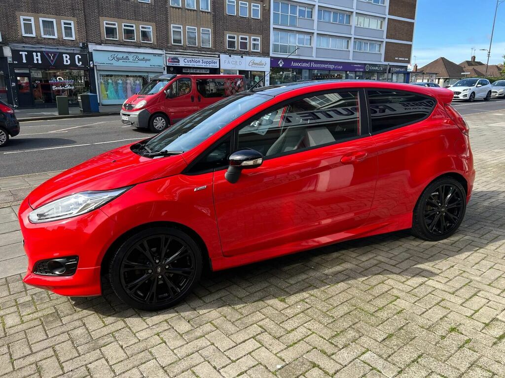 Compare Ford Fiesta Hatchback GV66CZN Red
