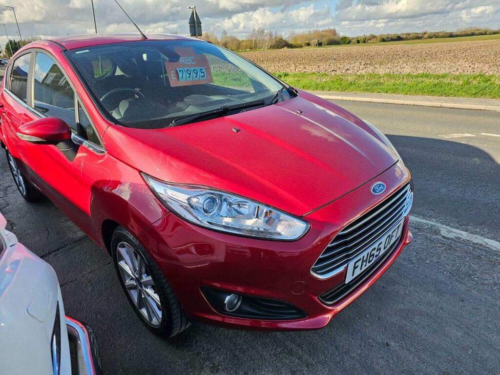 Compare Ford Fiesta Hatchback 1.0 FH65OFT Red
