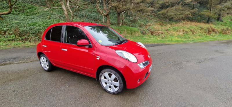 Compare Nissan Micra Hatchback RMN654M Red