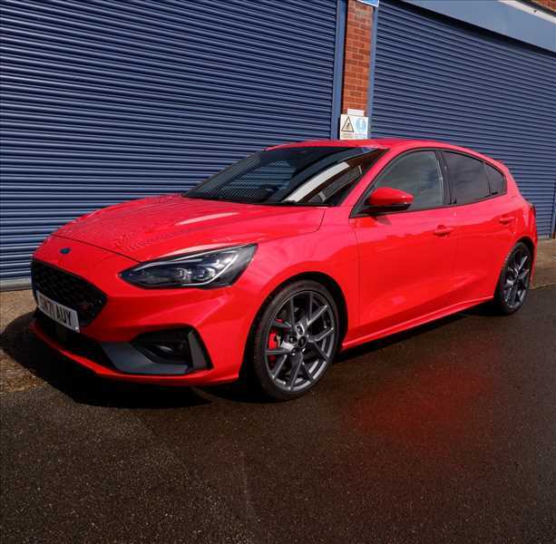 Compare Ford Focus Focus St SM71AUY Red