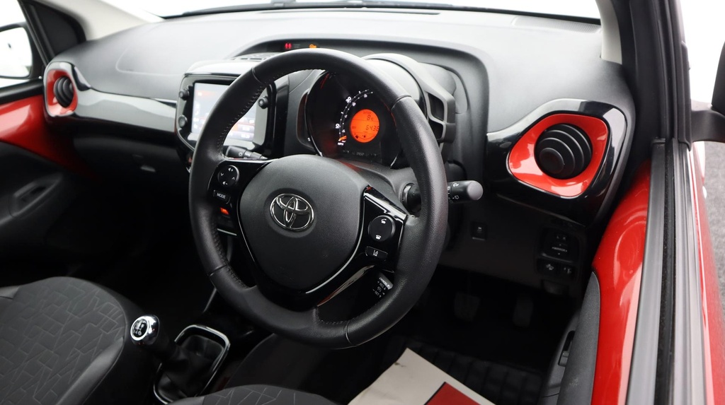 Compare Toyota Aygo X X-clusiv FP70DZO Red